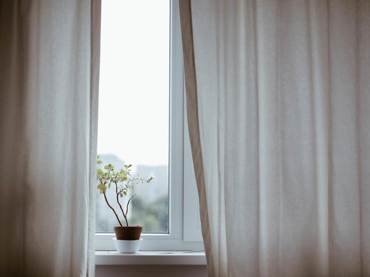 Editorial photograph for 7 Window-Cleaning Mistakes That Leave Coastal Glass Streaked or Damaged